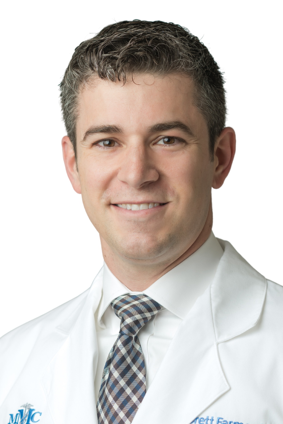 A man in a white coat and tie is named brett farmer md ophthalmology