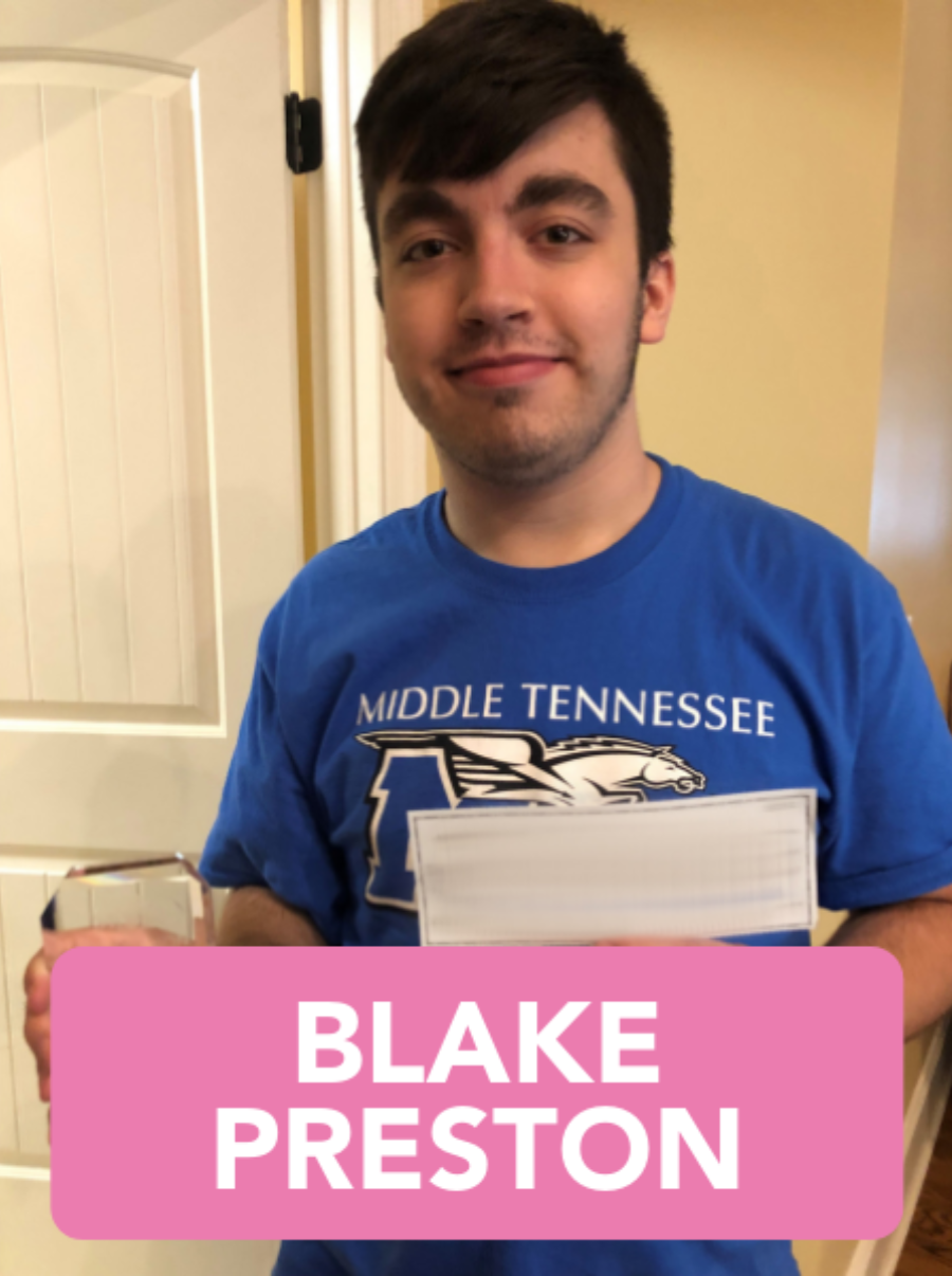 A man wearing a blue shirt that says middle tennessee