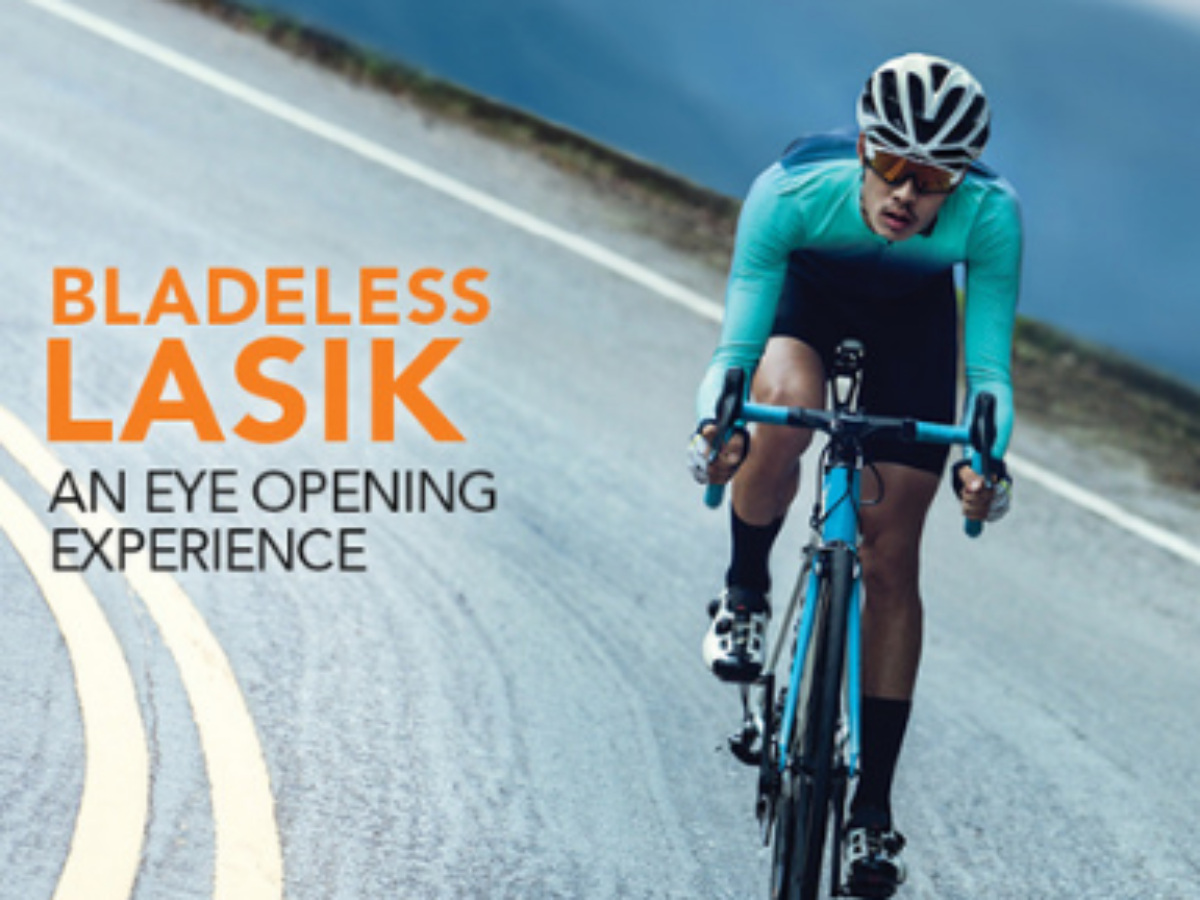 A man wearing a helmet and sunglasses is riding a bike down a road ..