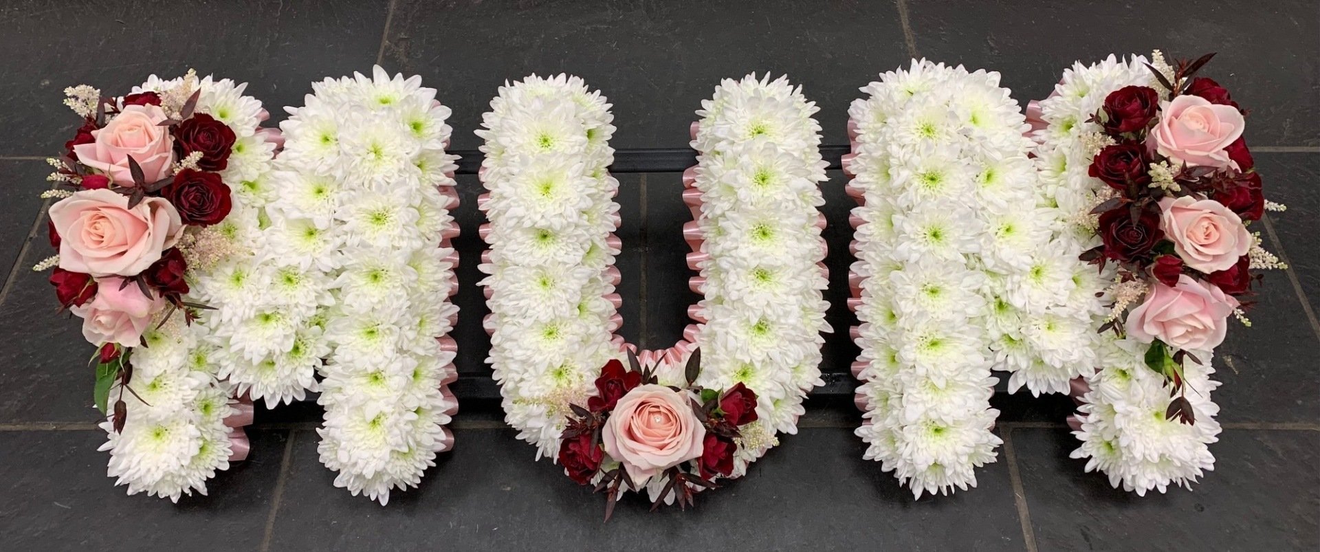 Flower arrangements for funeral displays in Bristol