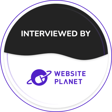 A circular badge with a black top half reading