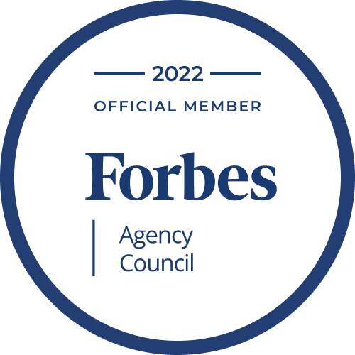 A dark blue circular badge with the text