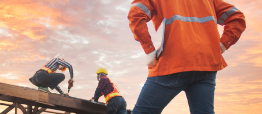 A group of construction workers are working on a bridge.