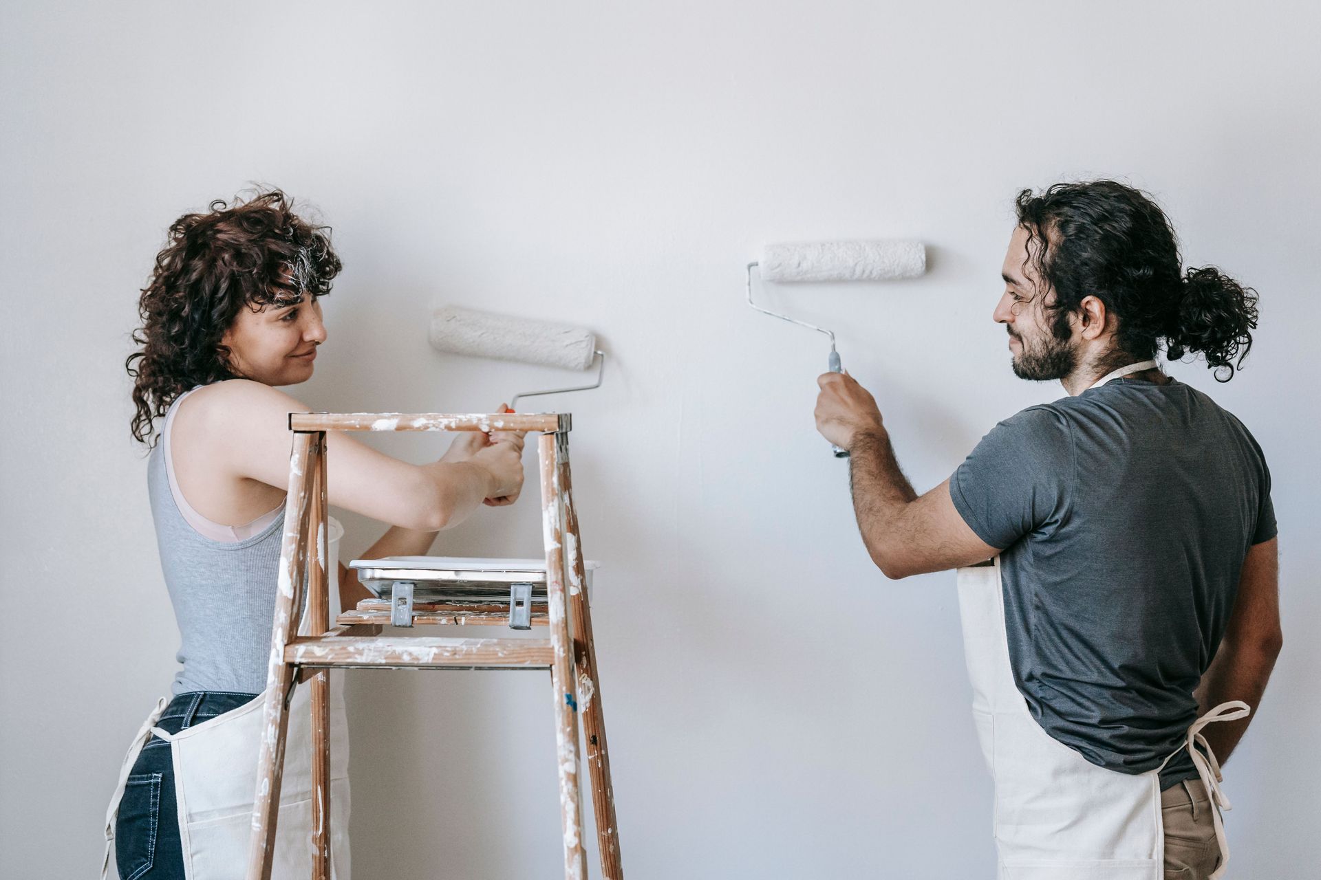 couple painting their walls