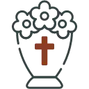 White flowers in a vase with a brown cross in the center