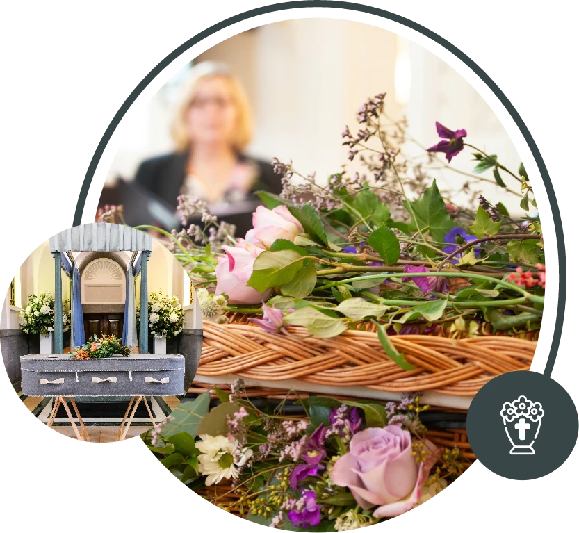 Floral arrangement of pink and purple roses with a blurred florist and funeral wreath display in the background