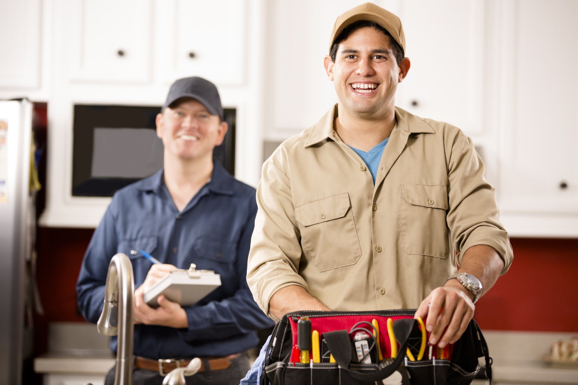 A Man With Plumbing Tools — Salina, KS — Salina Plumbing Company A Man With Plumbing Tools — Salina, KS — Salina Plumbing Company