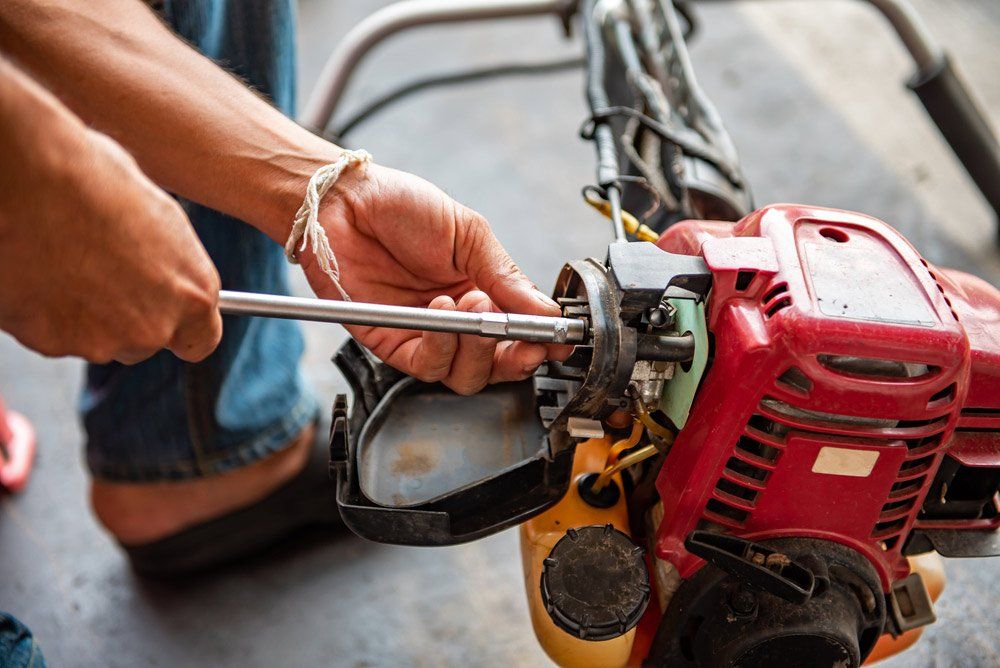 Repairman Fixes The Lawn Mower Engine With Tools — The Saw Spot In Kyogle NSW