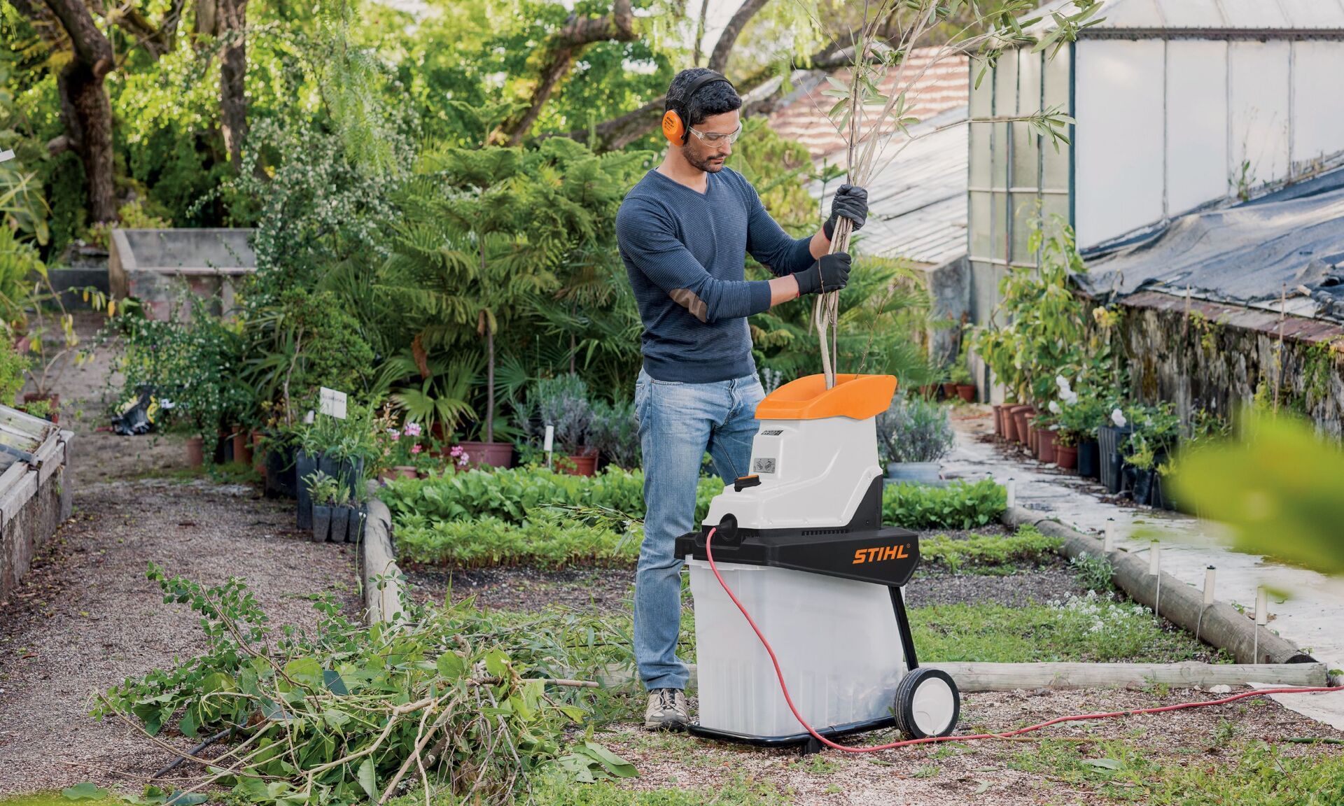 Garden Chipper, Electric Shredder With Wheelbarrow Full Of Wooden Mulch — The Saw Spot In Kyogle NSW