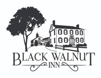 A black and white logo for a hotel called black walnut inn