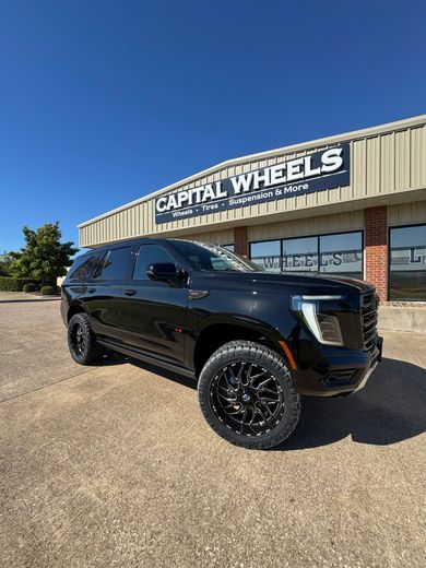 Black SUV parked in front of 