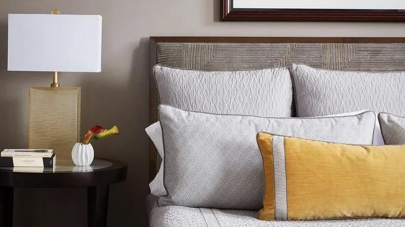 Pugerudes' custom decorative pillows in a modern Kent bedroom