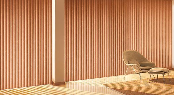 Elegant Pugerudes' vertical blinds covering large windows, perfect for stylish and functional interiors.