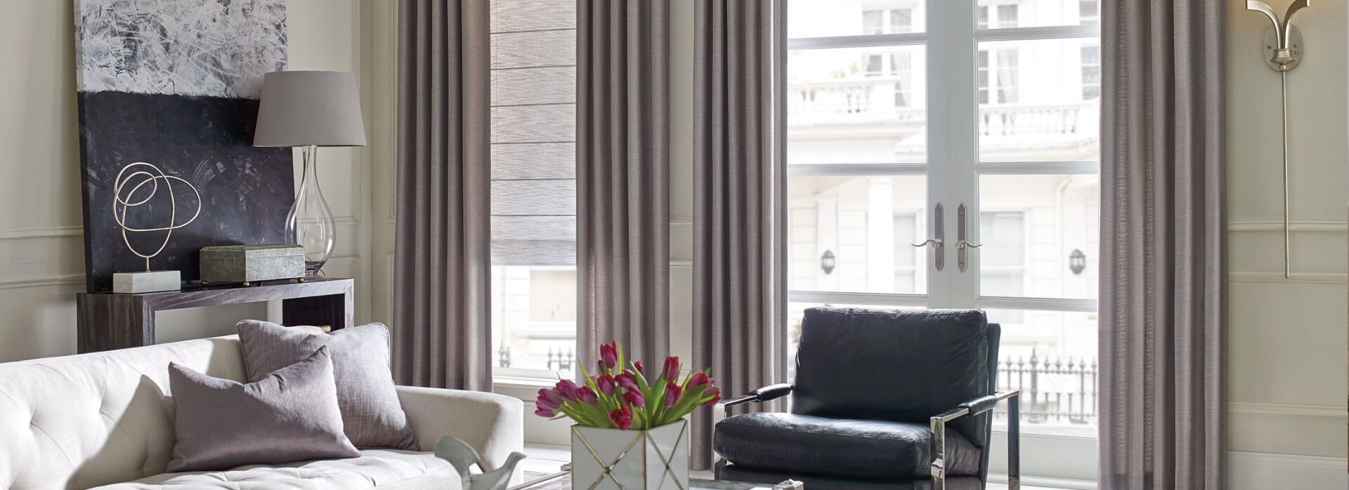Bright summer living room featuring Pugerudes' custom drapery trends that enhance comfort and design.