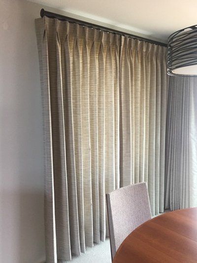 Dining room in Bellevue, WA with drapes