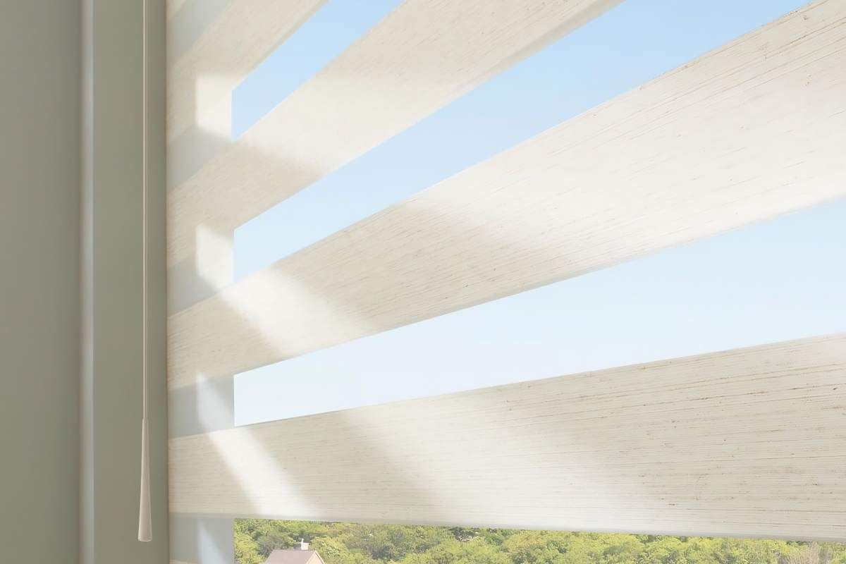 Hunter Douglas banded shades installed on a home’s windows