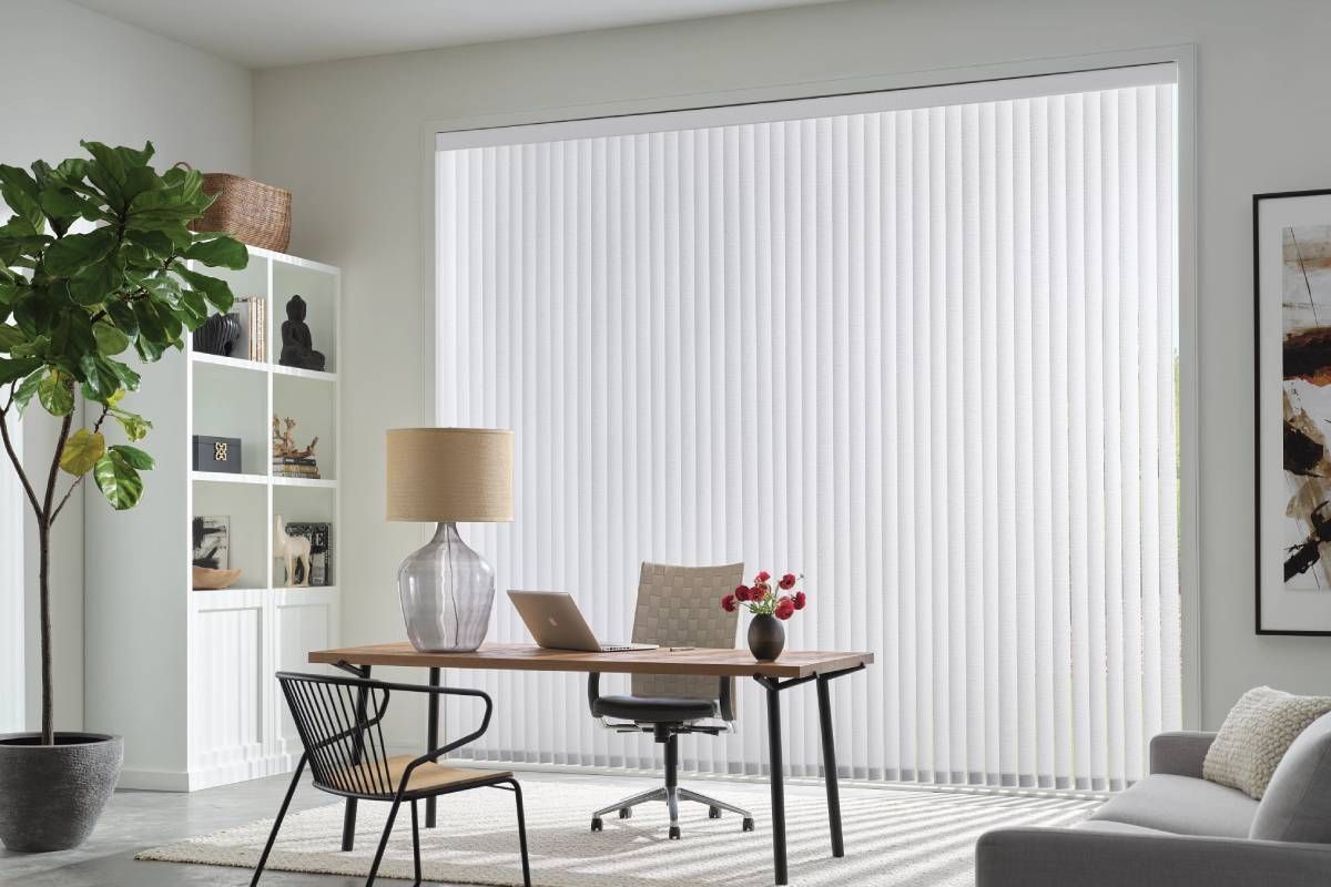 Hunter Douglas Vertical Solutions® Vertical Blinds hanging in the window of an office space near Kent, WA