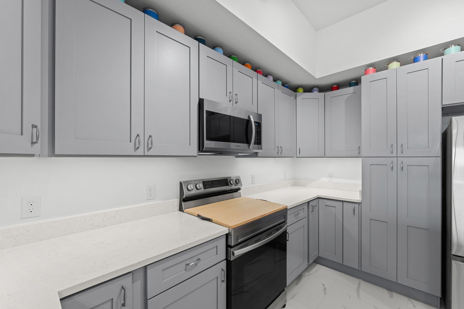 Kitchen with quartz countertops and custom cabinetry
