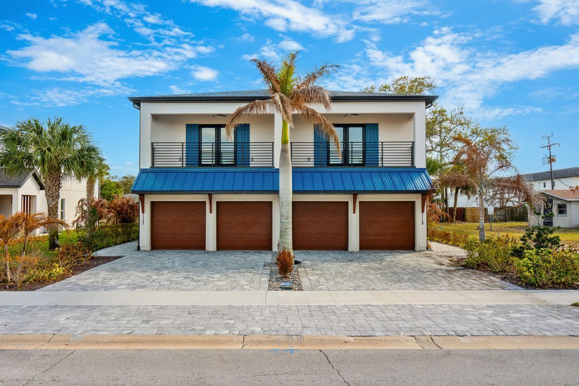 Exterior of the new 2025 multi-unit beach property at 115 Jefferson Avenue in Cape Canaveral, Florida