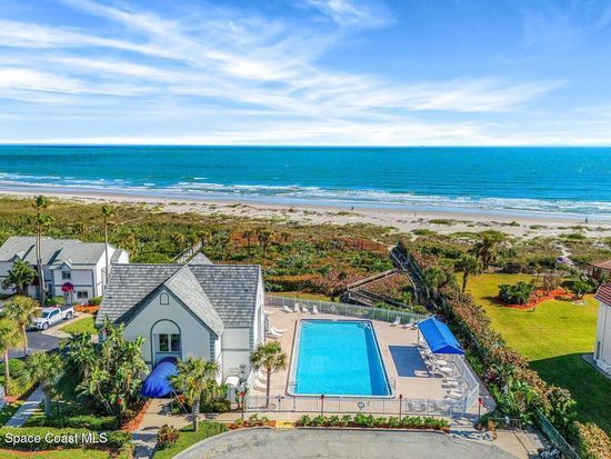 Oceanfront pool, beach access and coastal amenities near 220 Beach Park Lane Unit 75 in Cape Canaver
