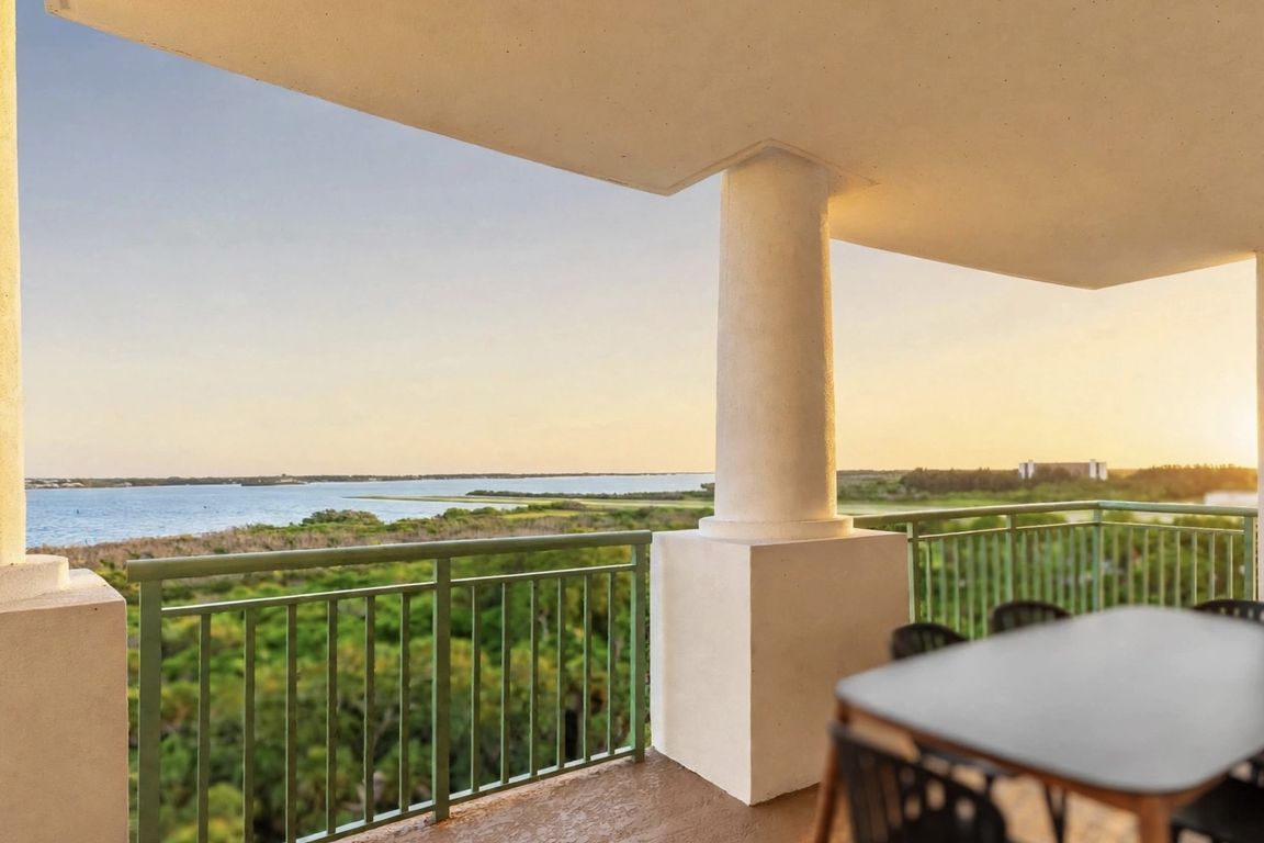 Waterfront balcony view from 735 Pilot Lane #908 at River Fly-In in Merritt Island, Florida, with panoramic scenery.