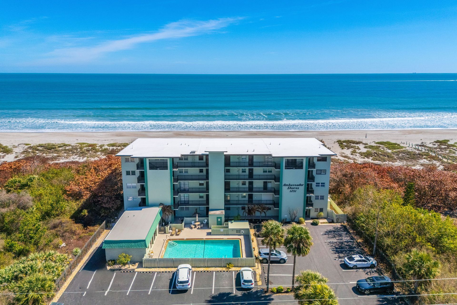 Atlantic shoreline and oceanfront condominium setting in Cocoa Beach.