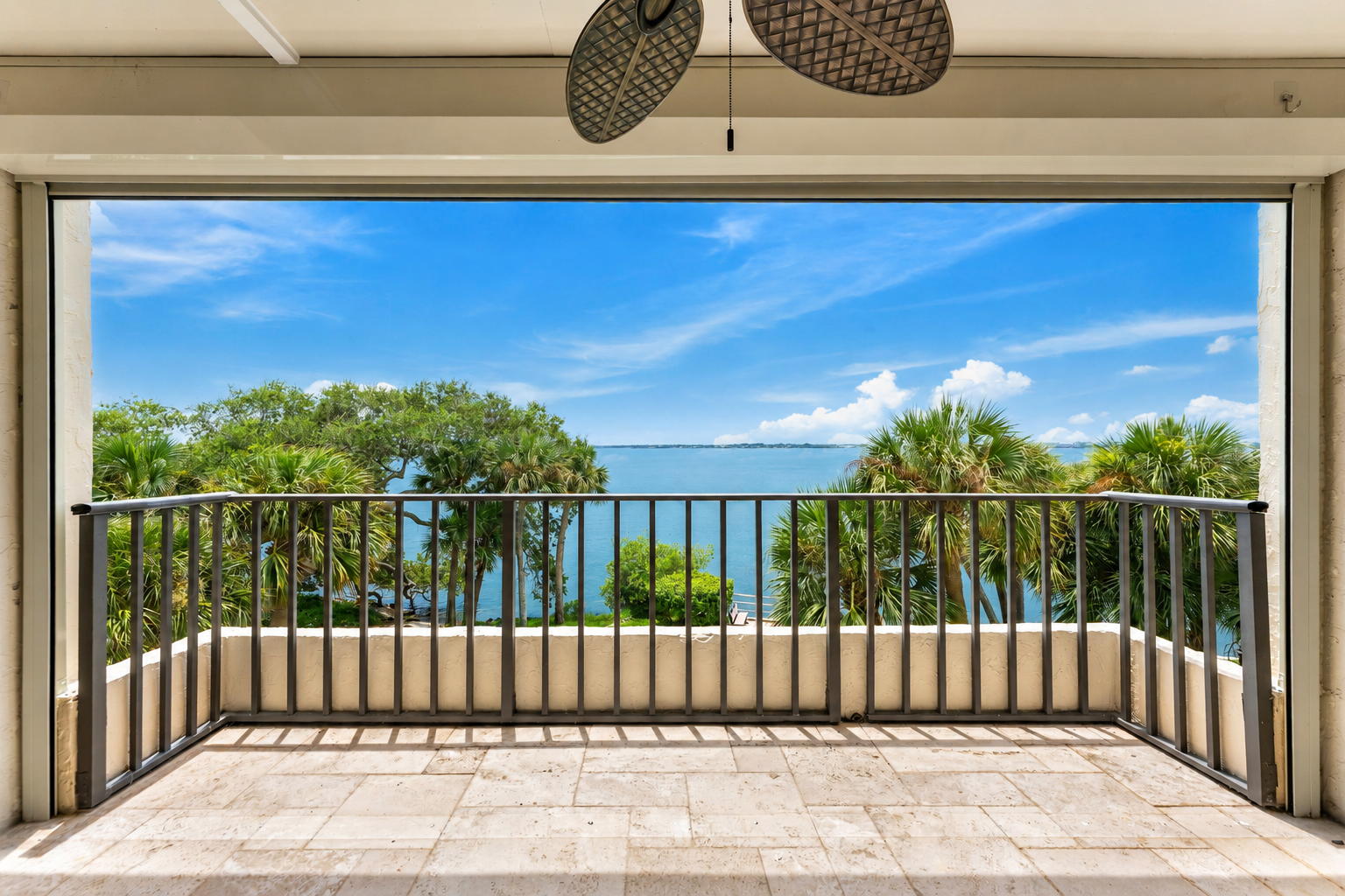 “Waterfront condo at 3220 River Villa Way Unit 121 overlooking the Indian River Lagoon in the gated Beach Woods community of Melbourne Beach, Florida.”