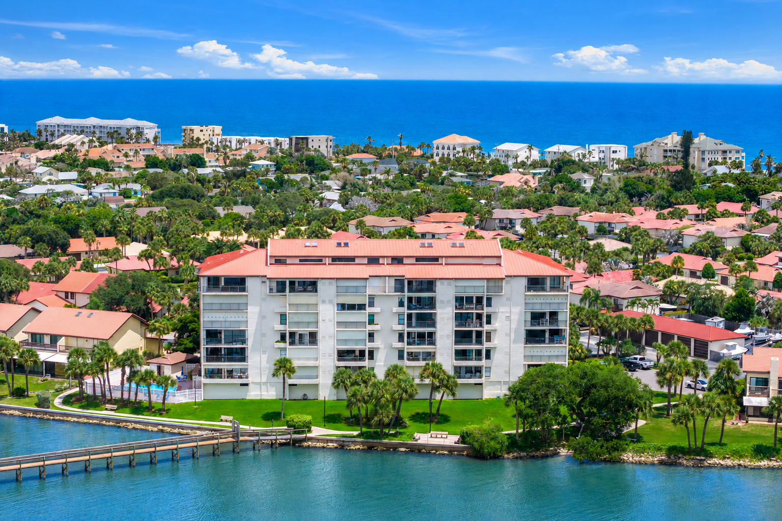 “Waterfront condo at 3220 River Villa Way Unit 121 overlooking the Indian River Lagoon in the gated Beach Woods community of Melbourne Beach, Florida.”