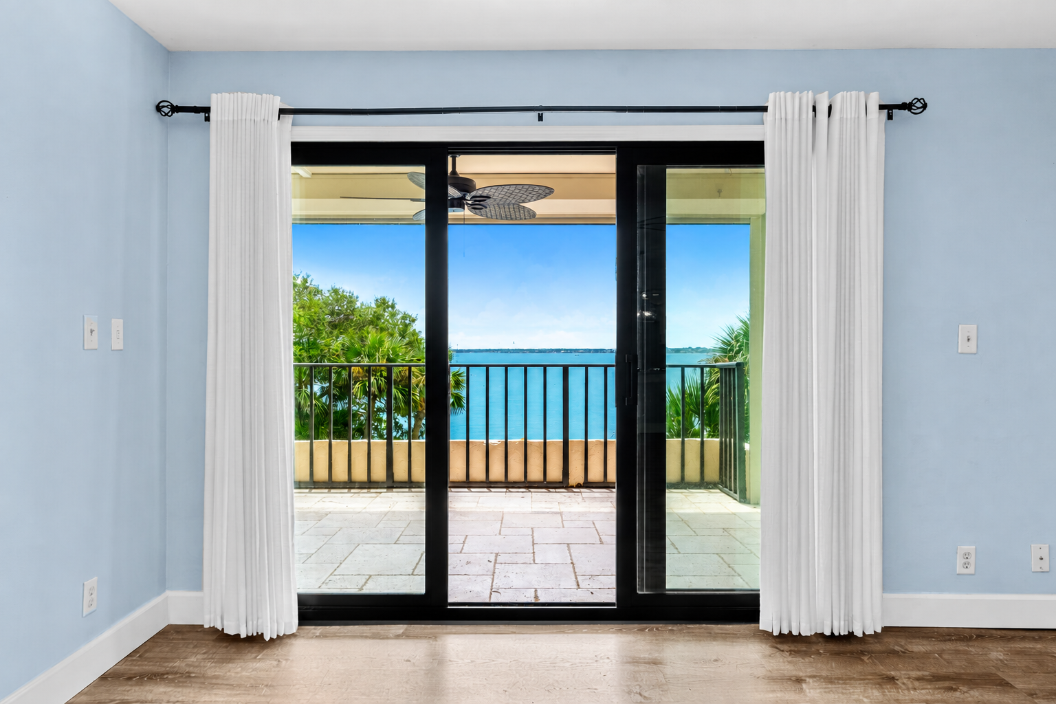 “Waterfront condo at 3220 River Villa Way Unit 121 overlooking the Indian River Lagoon in the gated Beach Woods community of Melbourne Beach, Florida.”