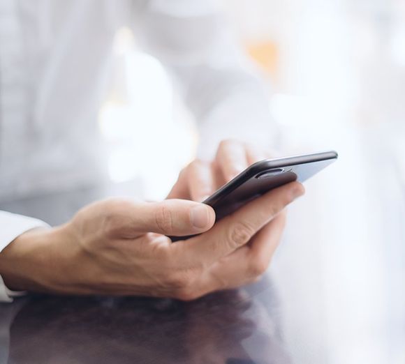 Person using a phone Person using a phone