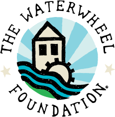 The Waterwheel Foundation logo with a house, waterwheel, and blue waves in a circular design