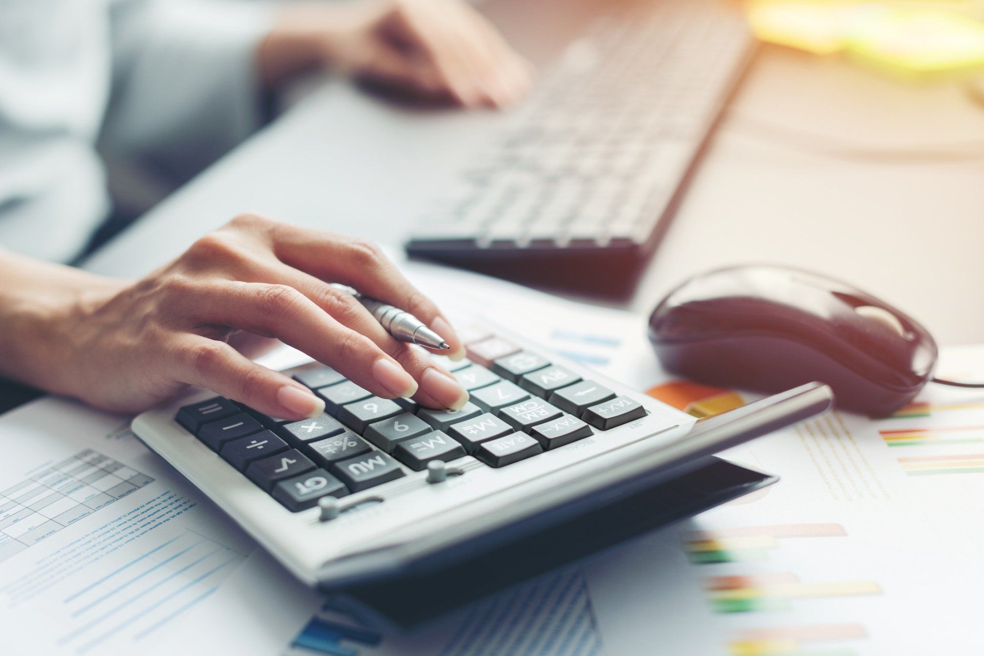 Accountant or Banker Making Calculations — Des Moines, IO — Cramer Law PLC