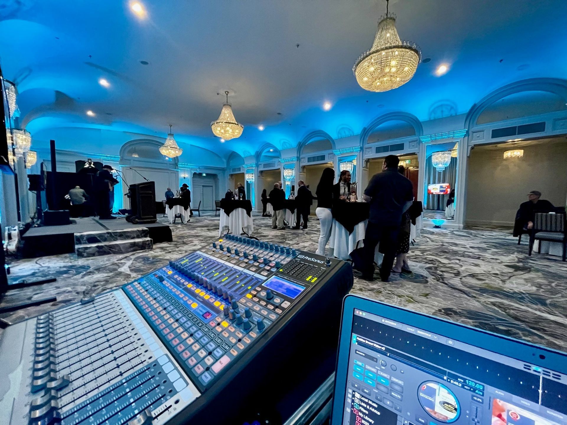 A mixer is sitting in the middle of a large room.