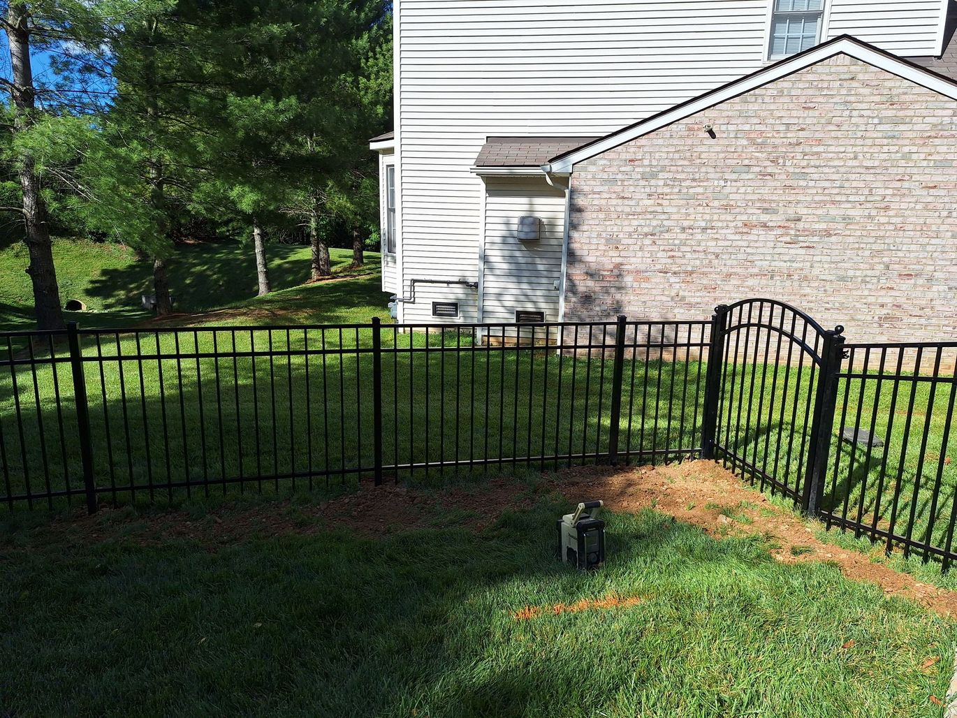 Black metal fence and gate