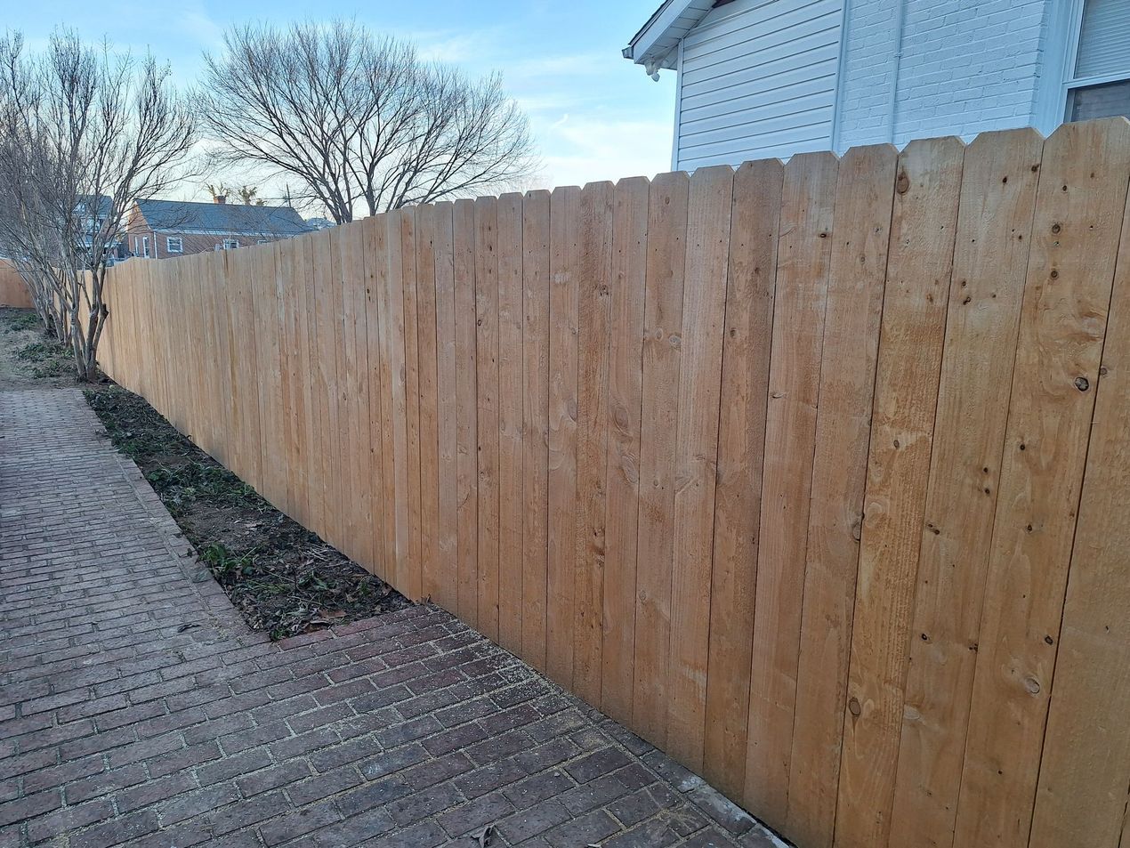 Wooden privacy fence.