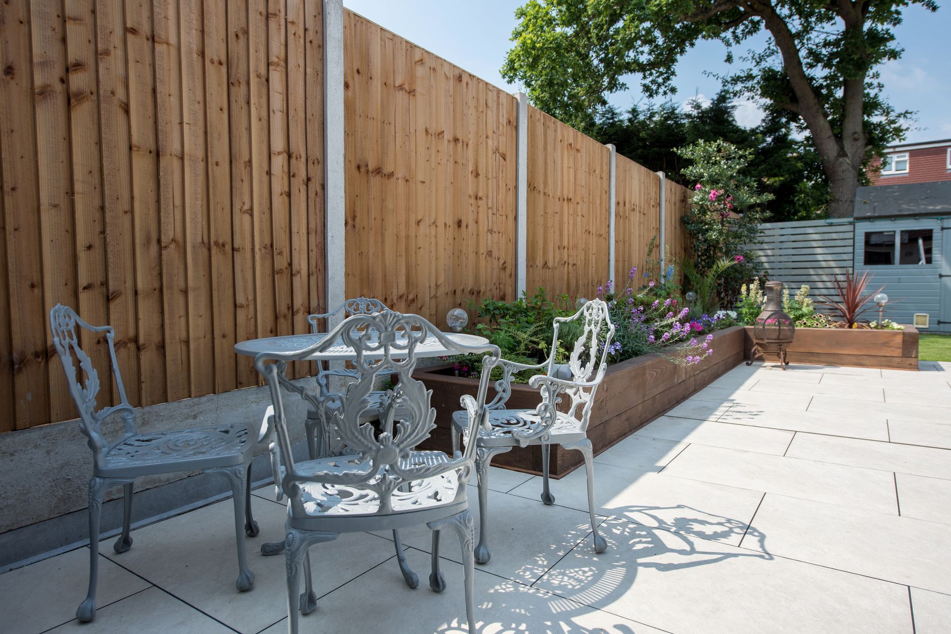 Patio with ornate furniture.