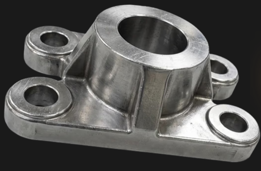 Ein Scan-Objekt: Metallhalterung mit zentralem Zylinder und vier Befestigungslöchern