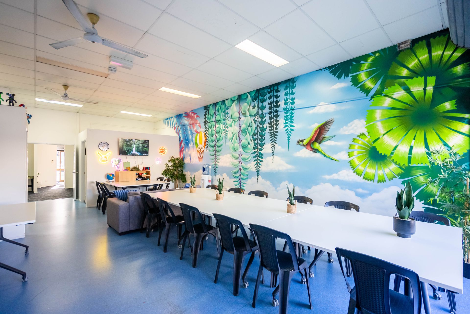 Bright Cafeteria With Long White Table, Black Chairs — Sparks Social Abilities in Bungalow, QLD