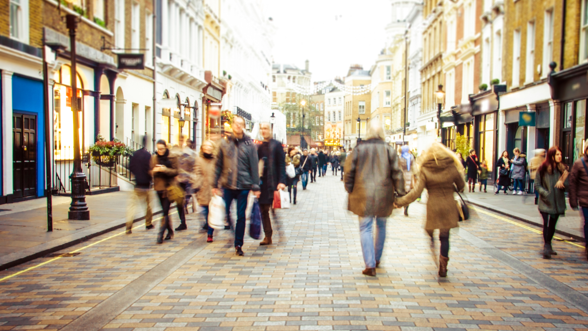 Busy high street with shoppers