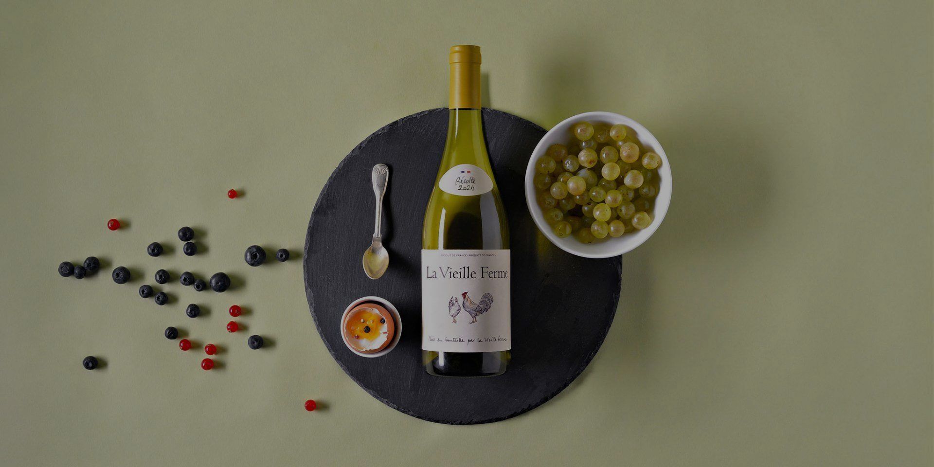 The Chicken Wine bottle on a table