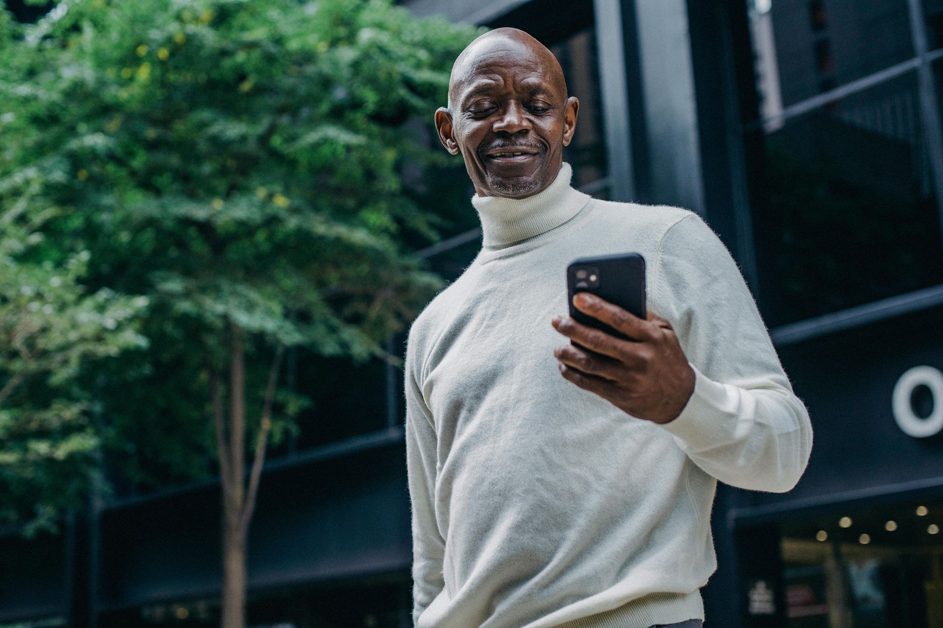 man scrolling his phone