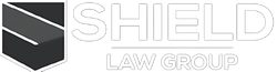 The logo for the shield law group is a black and white logo with a shield on it.