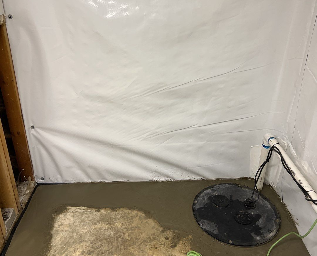 Completed basement waterproofing in an Alabama home b H2O Waterproofing. 