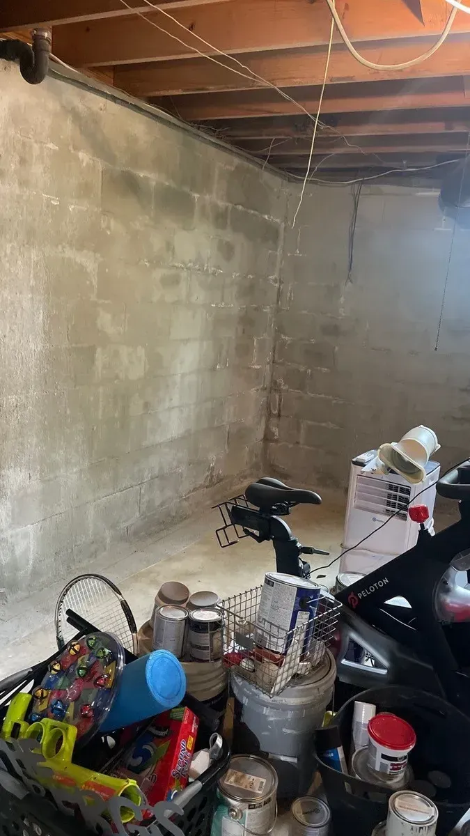 In Mountain Brook, AL installing Basement Waterproofing System done by H2O Waterproofing