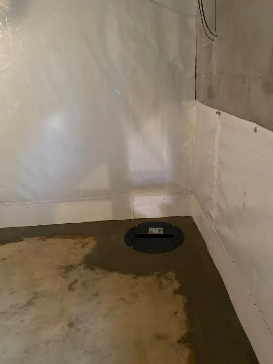 In Mountain Brook, AL installing Basement Waterproofing System done by H2O Waterproofing