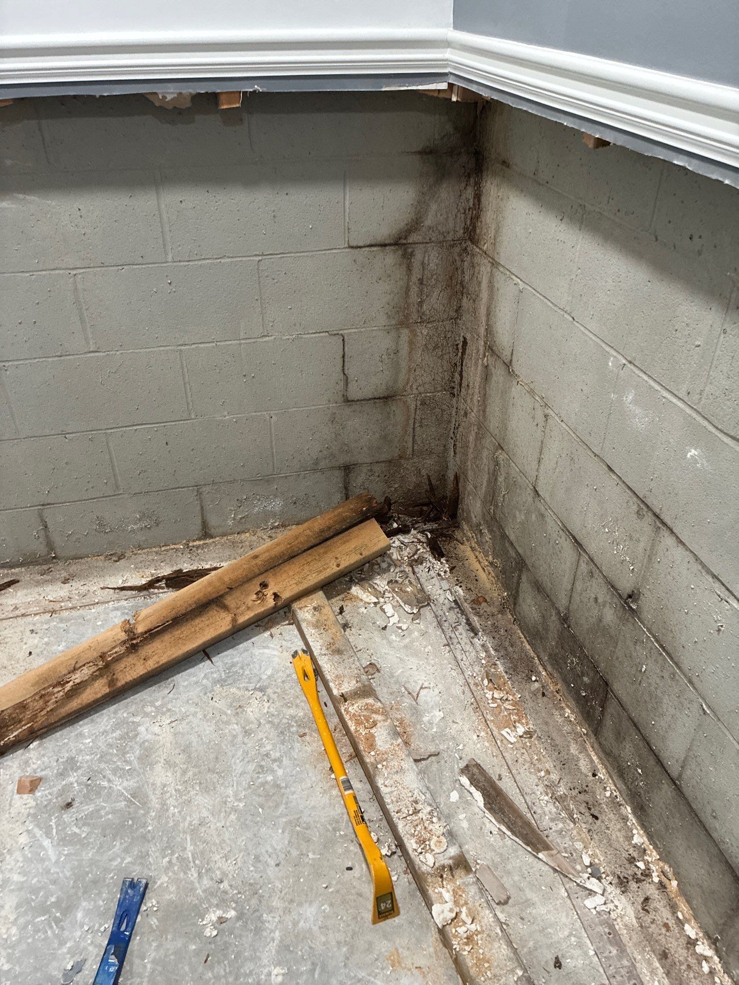 Symptom of hydrostatic pressure on a wet basement wall in a home in Birmingham, AL.