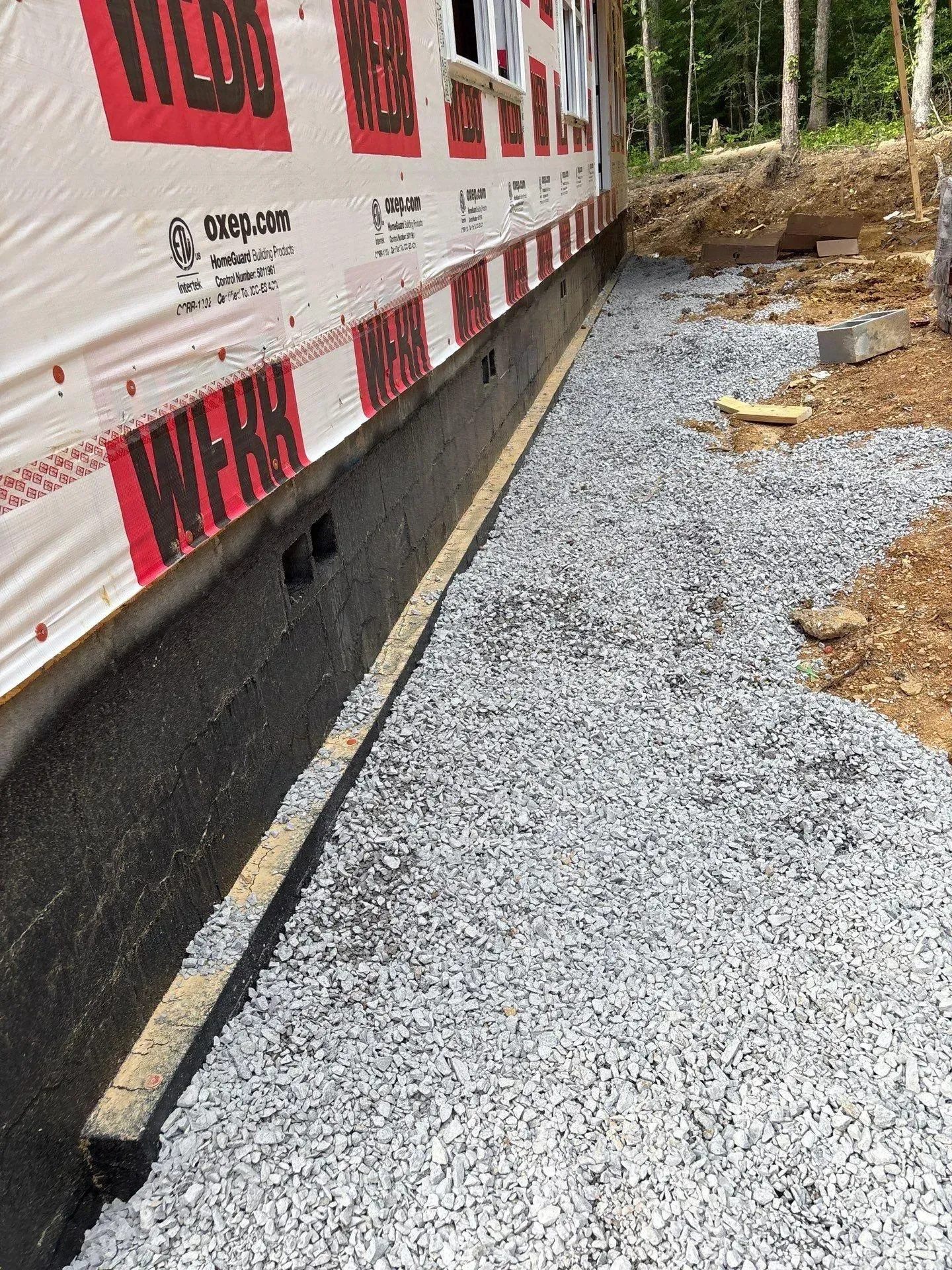 Exterior basement waterproofing in the Glen Cross subdivision of Trussville, AL 35173.