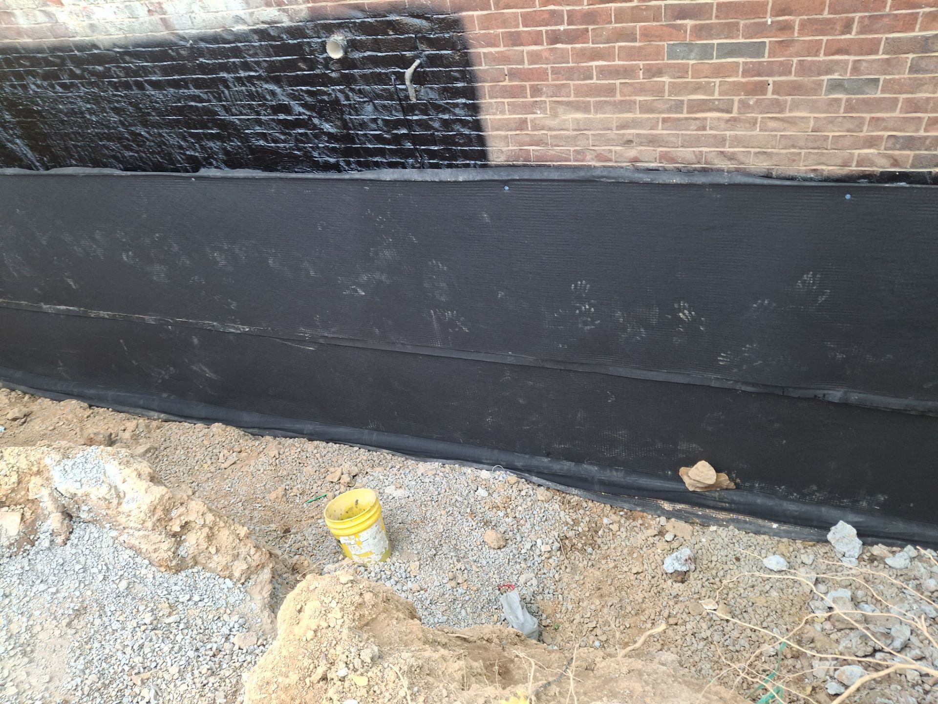 Exterior drains with discharge to daylight.