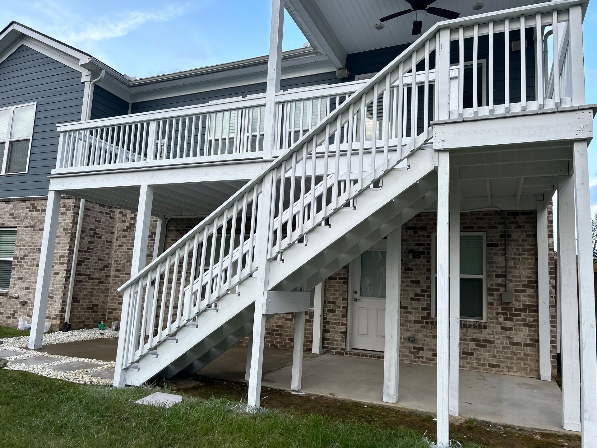 A house with stairs leading up to the second floor