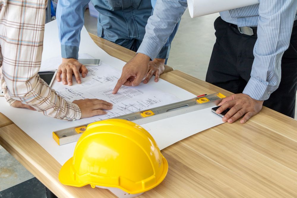 Professional Workers Discussing About Building Design